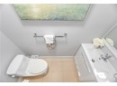Half bathroom featuring toilet