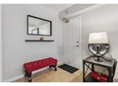 Doorway to outside featuring baseboards
