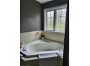 Bathroom featuring a garden tub