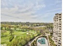 View of urban area featuring a golf club
