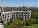 Drone / aerial view of a view of skyline and a tree filled landscape