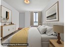 Bedroom with wood finished floors