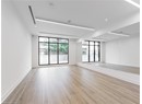 Spare room featuring light wood finished floors, baseboards, and recessed lighting