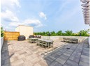 View of patio / terrace with outdoor dining space, area for grilling, and fence