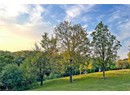 Surrounding community featuring a lawn