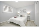 Bedroom with baseboards and light wood-style floors