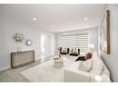 Living room with recessed lighting, baseboards, and wood finished floors