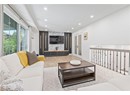 Living room featuring recessed lighting, wood finished floors, and baseboards