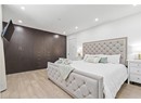 Bedroom with light wood-style floors and recessed lighting