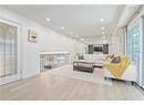 Living room featuring wood finished floors and recessed lighting