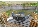 Wooden deck featuring outdoor dining area