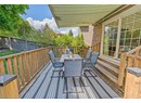 Wooden deck featuring outdoor dining area