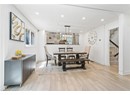 Dining room with stairway, light wood-style flooring, recessed lighting, baseboards, and a chandelier