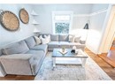 Living room with wood-type flooring