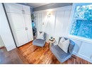 Living area with light hardwood / wood-style flooring