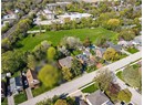 Aerial overview of property's location with nearby suburban area