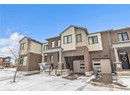 Townhome / multi-family property with a garage
