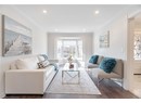 Living area featuring recessed lighting, wood finished floors, crown molding, and baseboards