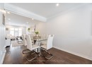 Dining area featuring baseboards, ornamental molding, wood finished floors, and recessed lighting