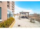 View of patio / terrace featuring fence, a gazebo, and an outdoor living space with a fire pit