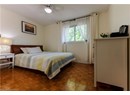 Bedroom featuring baseboards