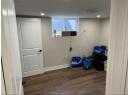 Washroom featuring dark wood-style flooring and recessed lighting