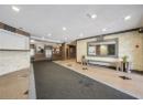 Common area with a textured ceiling and recessed lighting
