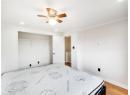 Bedroom featuring wood finished floors, recessed lighting, and ceiling fan