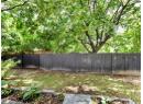 View of fenced backyard