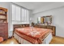 Bedroom featuring a textured ceiling