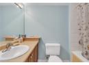 Full bath with vanity and shower / bath combo