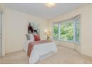 Bedroom featuring carpet