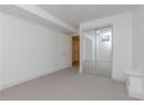 Unfurnished bedroom with carpet floors and a closet