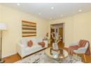 Sitting room with recessed lighting and wood finished floors