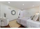 Bedroom featuring wood finished floors and recessed lighting