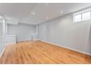 Below grade area featuring recessed lighting and light wood-style flooring
