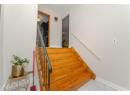 Stairway featuring baseboards and marble finish flooring