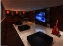 Cinema with marble finish floors and wooden walls