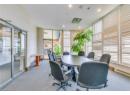 Home office featuring recessed lighting, carpet floors, and expansive windows